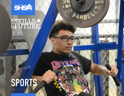 A Student lifting weights in a gym