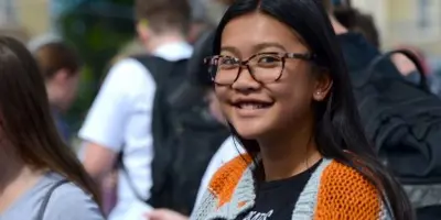 A young student smiling