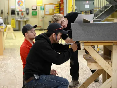 Technology teacher helps students