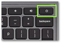 The top right portion of a Chromebook keyboard, with a green box around the power button