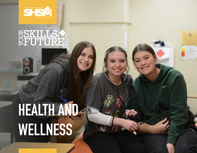 Three students in a health and wellness classroom